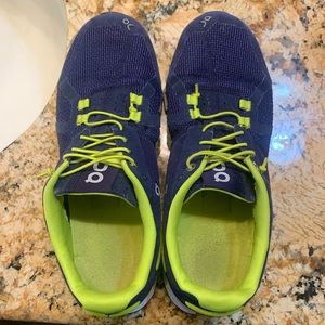 On running women’s sneakers. Size 9.5 with mesh detail. Clean, Good condition.